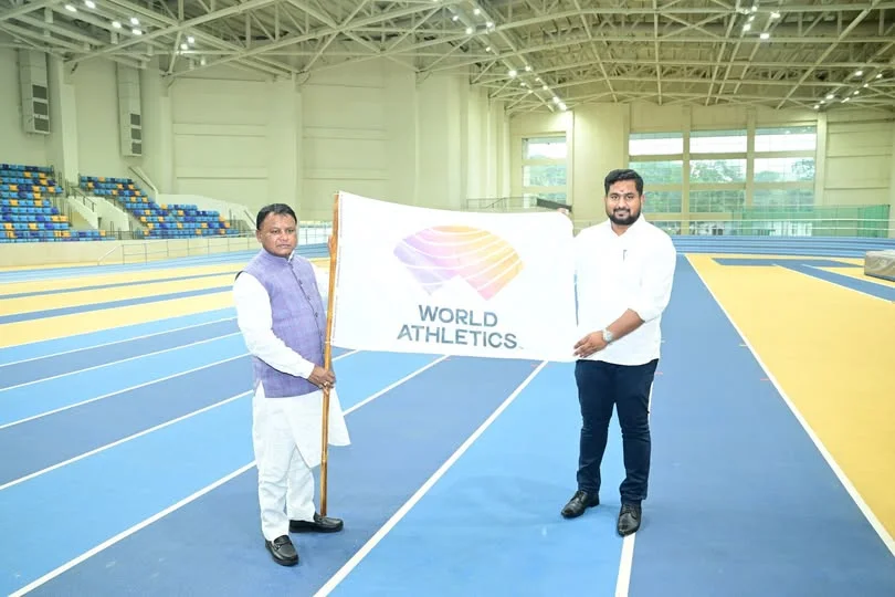 CM Mohan Charan Majhi receiving the flag