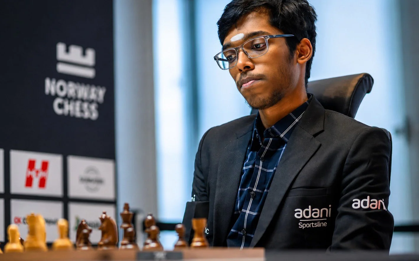 R Praggnanandhaa at the Norway Chess 2026 tournament in Oslo after winning the classical title, with Magnus Carlsen in the same event.