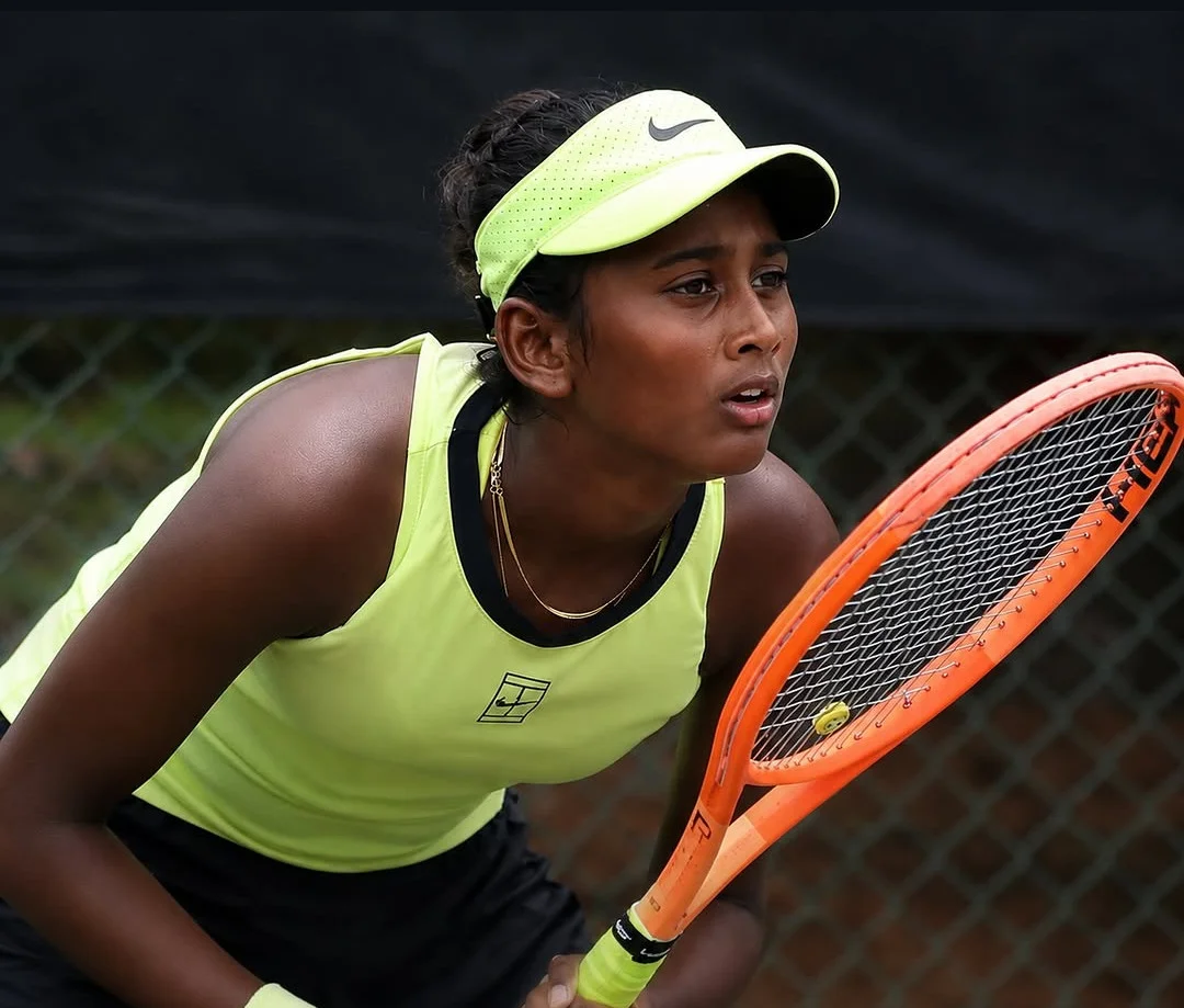 Junior tennis player competing during an ITF junior tennis tournament match.